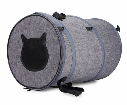 Collapsible pet carrier bag made of durable Oxford cloth, accommodating pets up to 18kg with a unique skylight design and lightweight, foldable construction