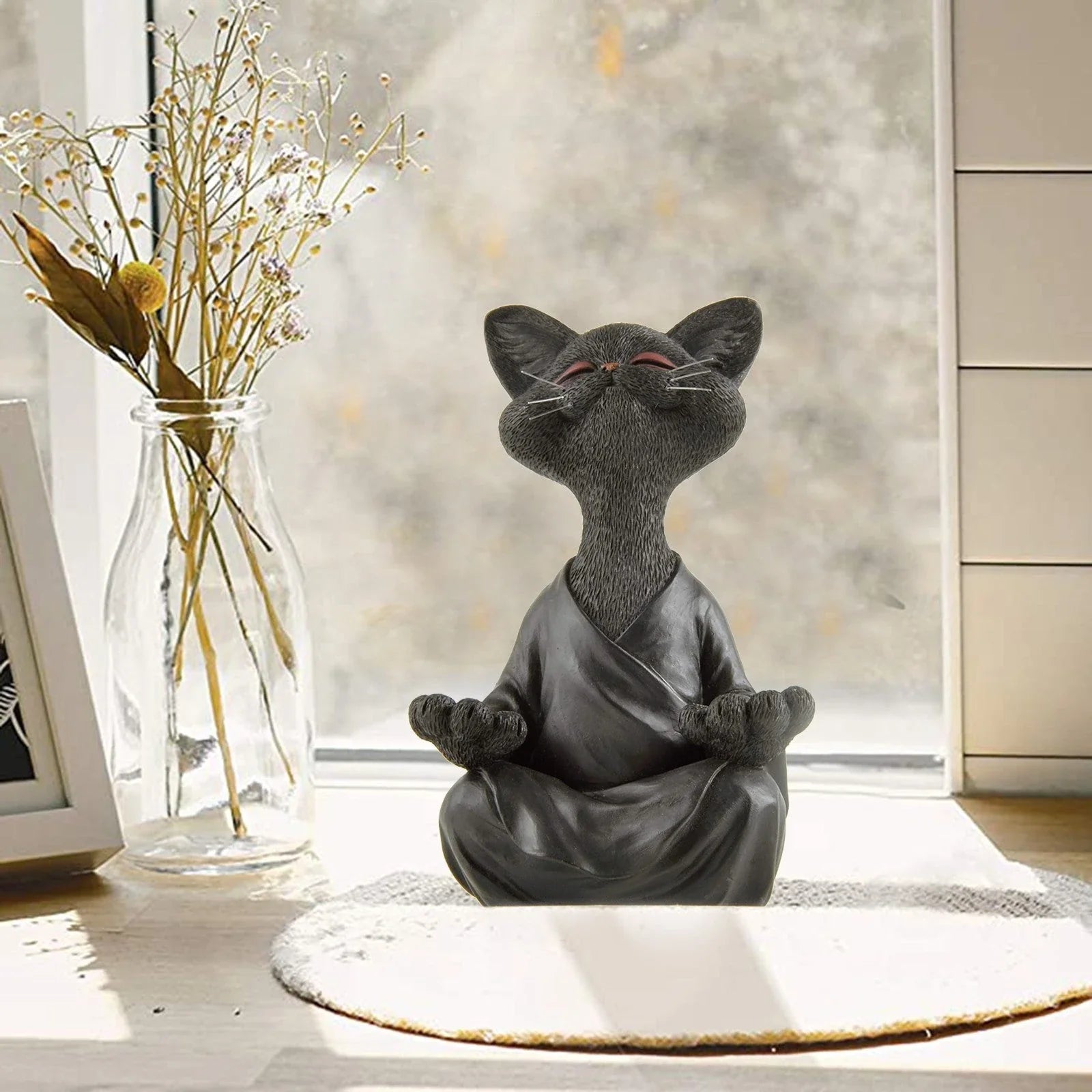 Captivating Black Buddha Cat Figurine crafted from premium resin, perfect for meditation spaces, yoga studios, and home decor