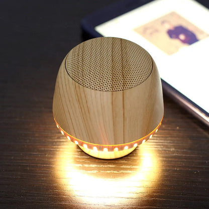 Portable Mushroom Bluetooth Speaker with LED Night Light in wood color and black