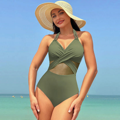 Stylish halter-neck one-piece swimsuit in various colors with cross-strap details and mesh design, perfect for summer beach and vacation wear
