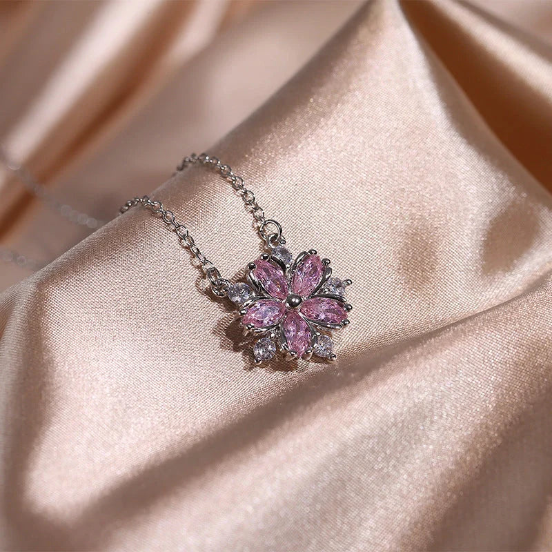 Exquisite zircon jewellery set with double-layered flower design and shimmering cubic zirconia stones