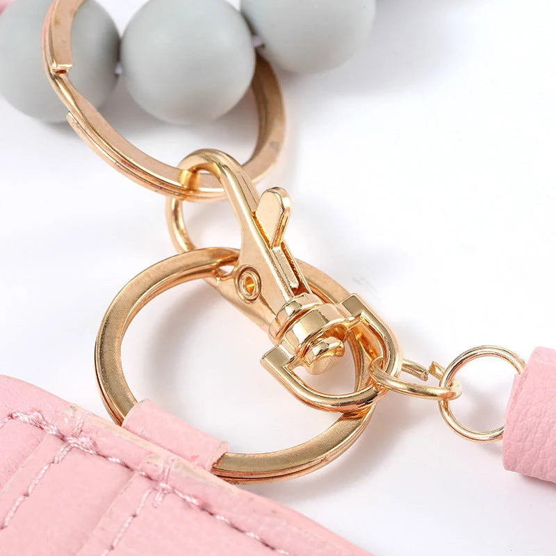 Women's silicone beads and PU tassel bracelet keychain in various colours