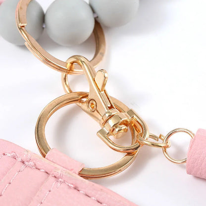 Women's silicone beads and PU tassel bracelet keychain in various colours