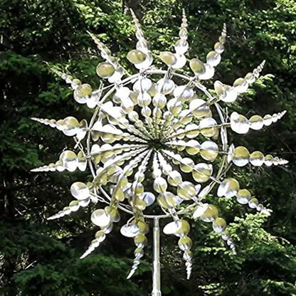 Elegant revolving metal windmill outdoor ornament with dual-layered blades creating a mesmerizing display in the garden