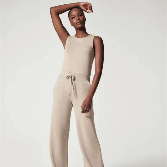 Women's lace-up jumpsuit pants in polyester, sleeveless design, available in multiple colors and sizes