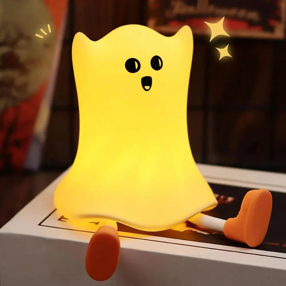 A Halloween-themed bedside lamp in the shape of a ghost, emitting a soft, calming glow.