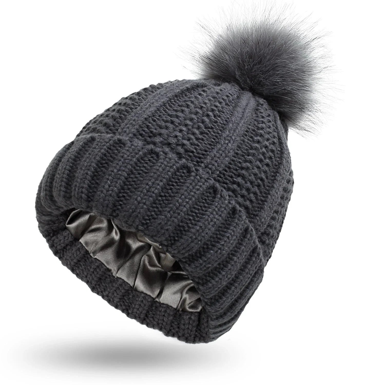 Stylish knit beanie with satin lining and faux fur pom-pom for women, available in multiple color options