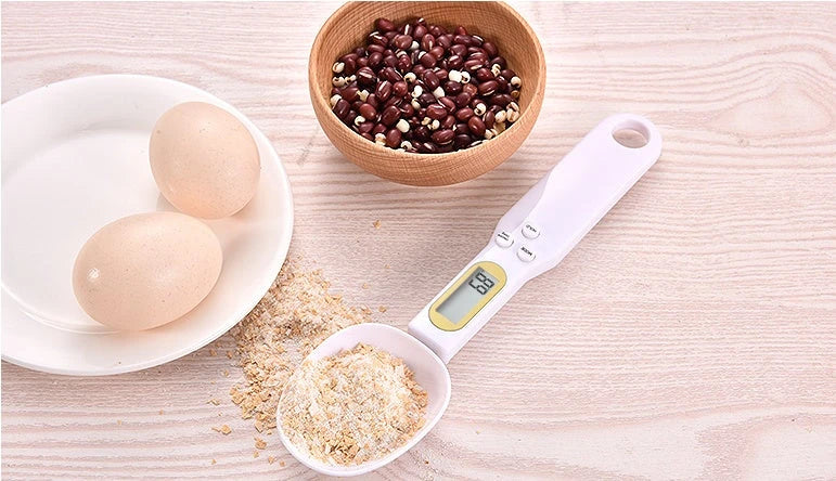 Versatile digital kitchen scale with precise measurements from 0.1g to 500g, multiple unit options, and compact design for easy storage