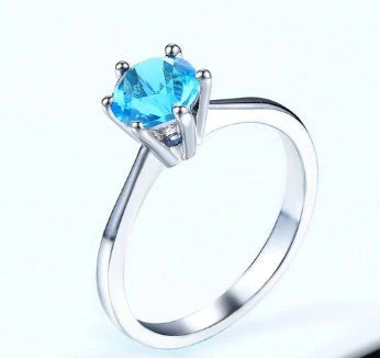 Elegant rose gold and zircon ring with a geometric design and sparkling zircon stones