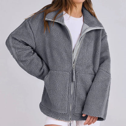 Classic padded fleece jacket in various colours for women, featuring a zip-up design and pockets