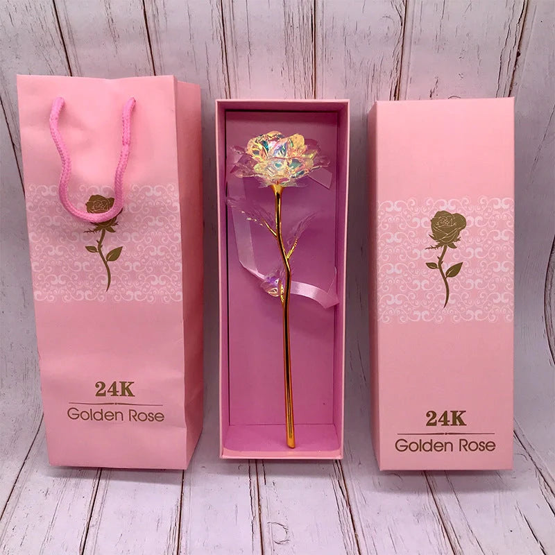A luxurious 24K gold-plated rose flower bouquet set with a gift box and tote bag