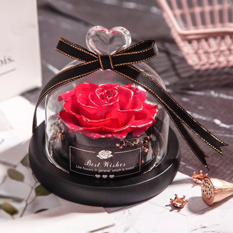 Enchanting Eternal Rose with LED lighting in a glass display, showcasing its timeless beauty and elegant design