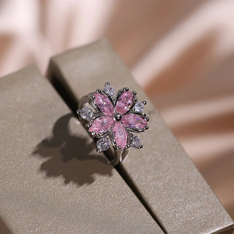 Exquisite zircon jewellery set with double-layered flower design and shimmering cubic zirconia stones