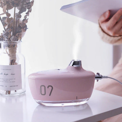 Compact USB-powered air humidifier with night light function for desks and bedrooms
