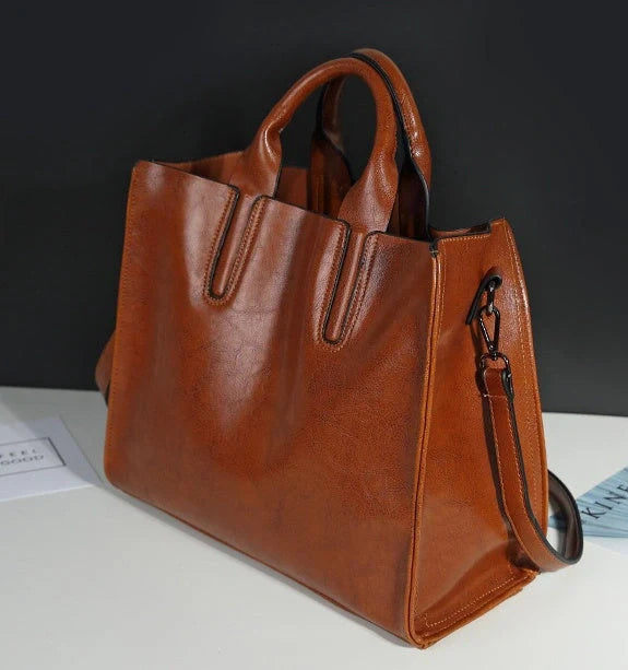 Sofia Spanish Trunk Tote in various colours with multiple compartments and zipper opening