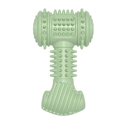 Indestructible TPR dog chew toy in blue, pink, and green for teeth cleaning and anxiety relief