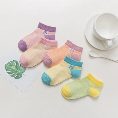 Breathable cotton baby socks in multiple colours for ages 0-9