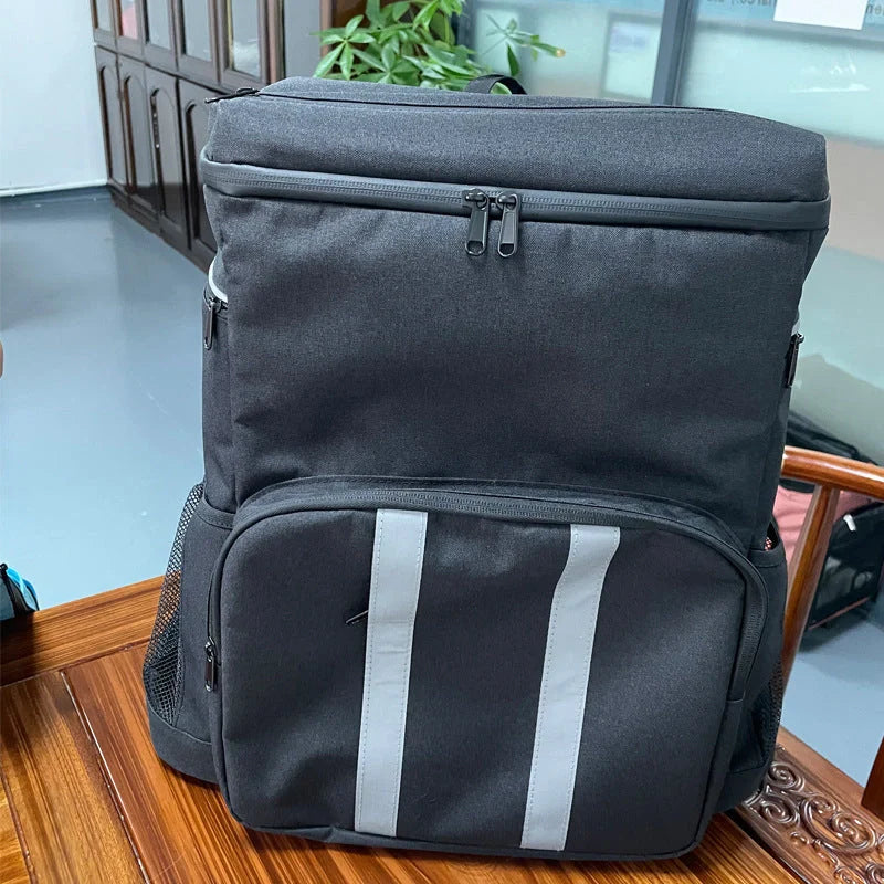 Premium refrigerated backpack in grey and black colours, perfect for picnics and outdoor adventures in the British countryside
