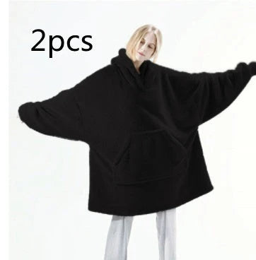 Cozy oversized hooded sweatshirt with big front pocket, made of soft double-sided fleece fabric in a variety of classic colors.