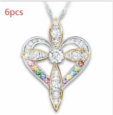 Elegant heart-shaped cross pendant necklace with adjustable chain, perfect for unisex wear.