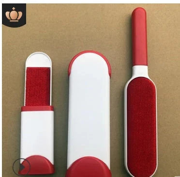 A reusable pet hair remover comb with a self-cleaning base, perfect for removing fur and lint from sofas, chairs, and other upholstery.