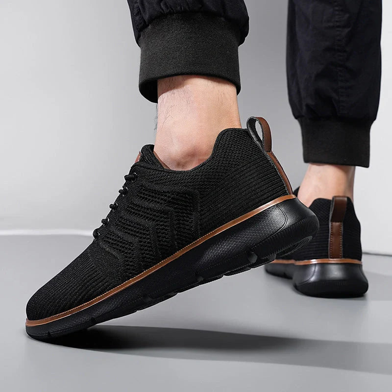 Men's black lace-up mesh sneakers with round toe design