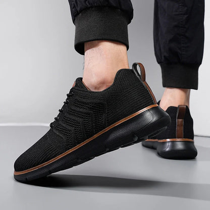 Men's black lace-up mesh sneakers with round toe design