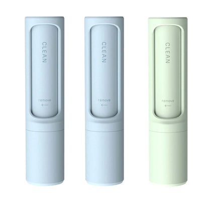 Rotating cylinder electrostatic pet hair remover brush in white, blue, green, and pink