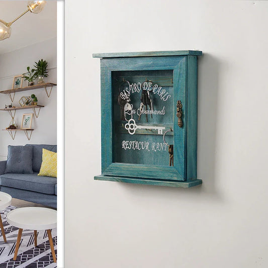 Vintage-style wooden key cabinet with six hanging hooks, offering a compact and stylish storage solution for your keys and small items.