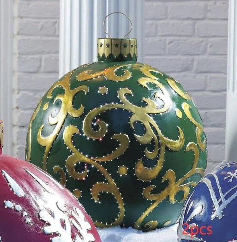 Inflatable Christmas baubles in various festive designs for outdoor holiday decoration