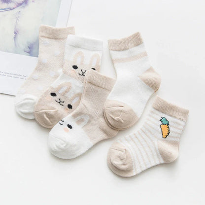 Breathable cotton baby socks in multiple colours for ages 0-9