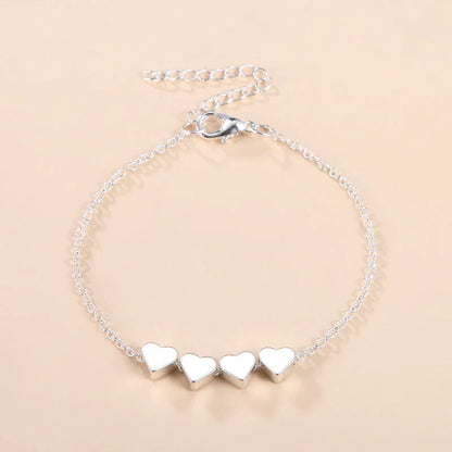 Korean-inspired thin chain heart bracelet for women in gold and silver