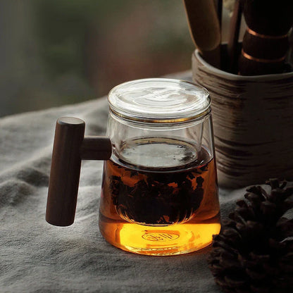Premium borosilicate tea infuser cup with natural walnut handle, available in various sophisticated colour options