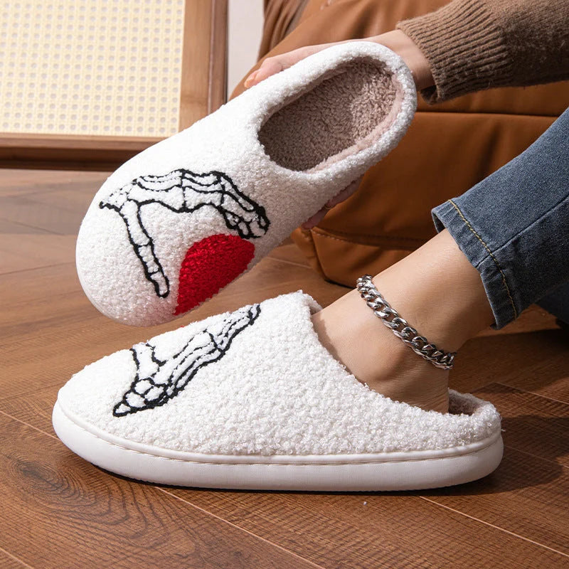 Halloween Skull Hand Slippers in black and white with non-slip soles