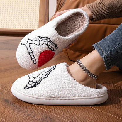 Halloween Skull Hand Slippers in black and white with non-slip soles
