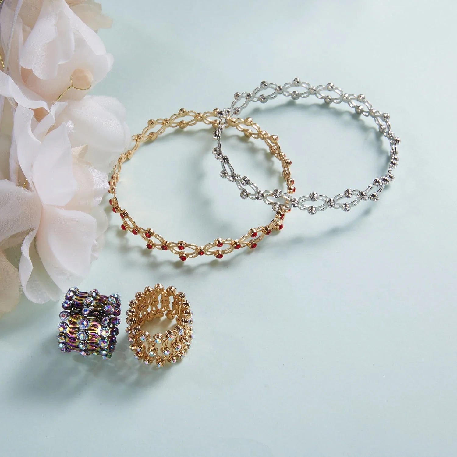 2-in-1 folding retractable rings bracelet with rhinestone detail, adjustable design