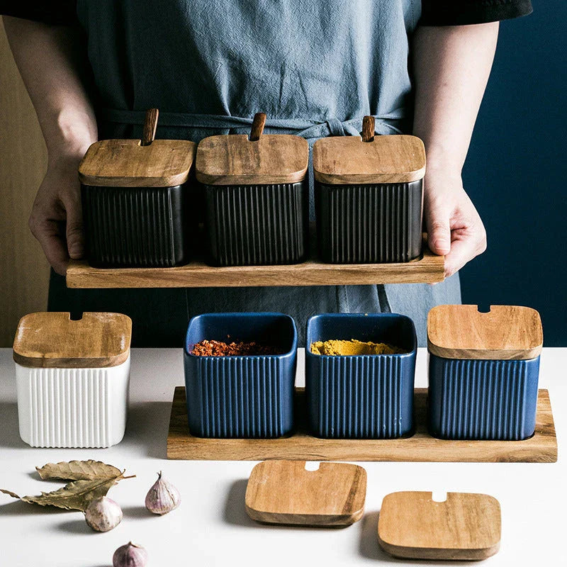 Stylish ceramic seasoning box set with sleek matte finish and airtight lids, perfect for organising spices in a modern British kitchen