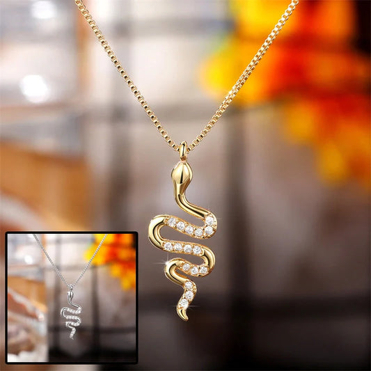 Snake pendant necklace with zirconia stones in white gold and gold finishes