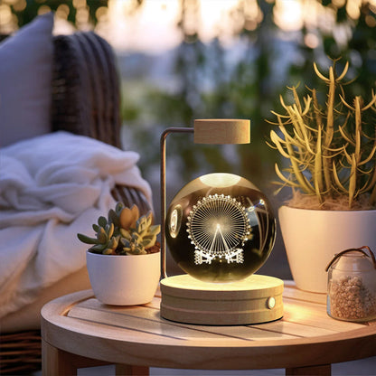Enchanting crystal ball night light with cosmic designs, creating a warm and soothing ambiance in any room.