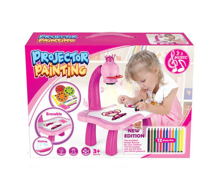 A smart projection art desk with various colourful patterns, drawing pens, and a blank drawing book, designed to stimulate children's creativity and intellectual development.