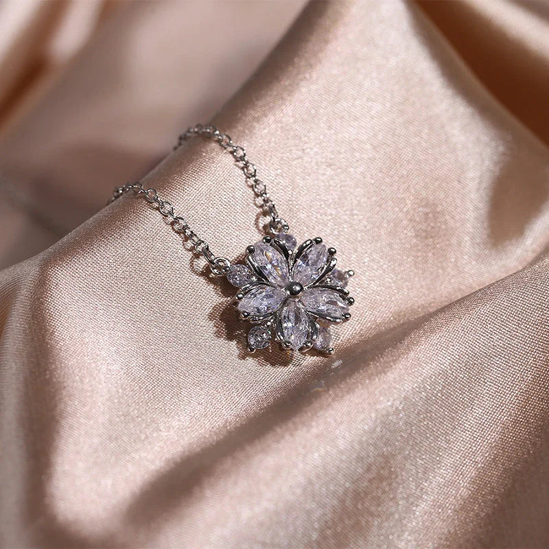Exquisite zircon jewellery set with double-layered flower design and shimmering cubic zirconia stones