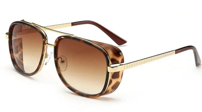 Stylish driving sunglasses with a retro-inspired design, durable metal and plastic frame, and advanced UV protection for all-weather driving and outdoor activities.