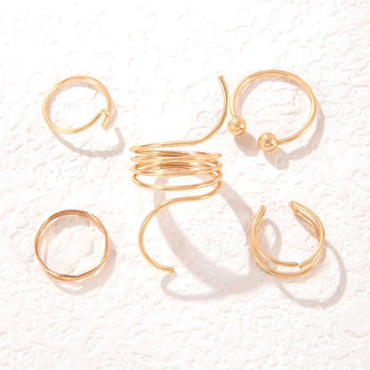 Stylish retro wave open ring in gold, perfect for elevating any outfit