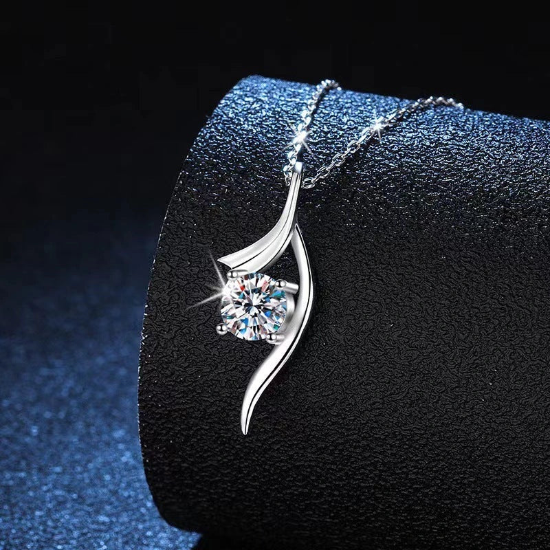 Elegant 925 sterling silver necklace with a sparkling moissanite diamond pendant, showcasing exceptional British craftsmanship.