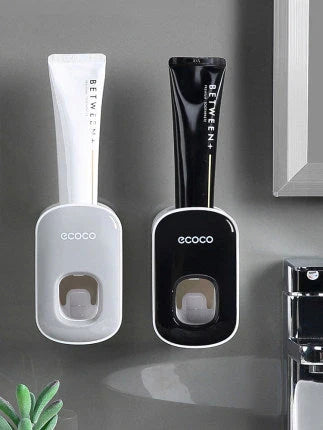 Wall-mounted automatic toothpaste dispenser with storage cups for toothbrush and bathroom accessories