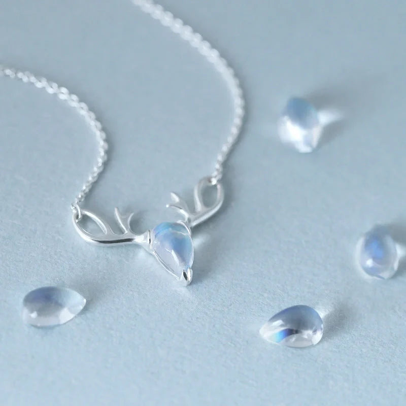 Elegant silver-toned elk necklace with a captivating moonstone pendant, a stunning Korean-inspired jewellery piece