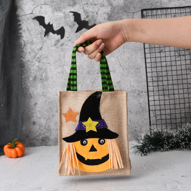 Halloween themed tote bag for kids featuring witch, skull, and pumpkin designs