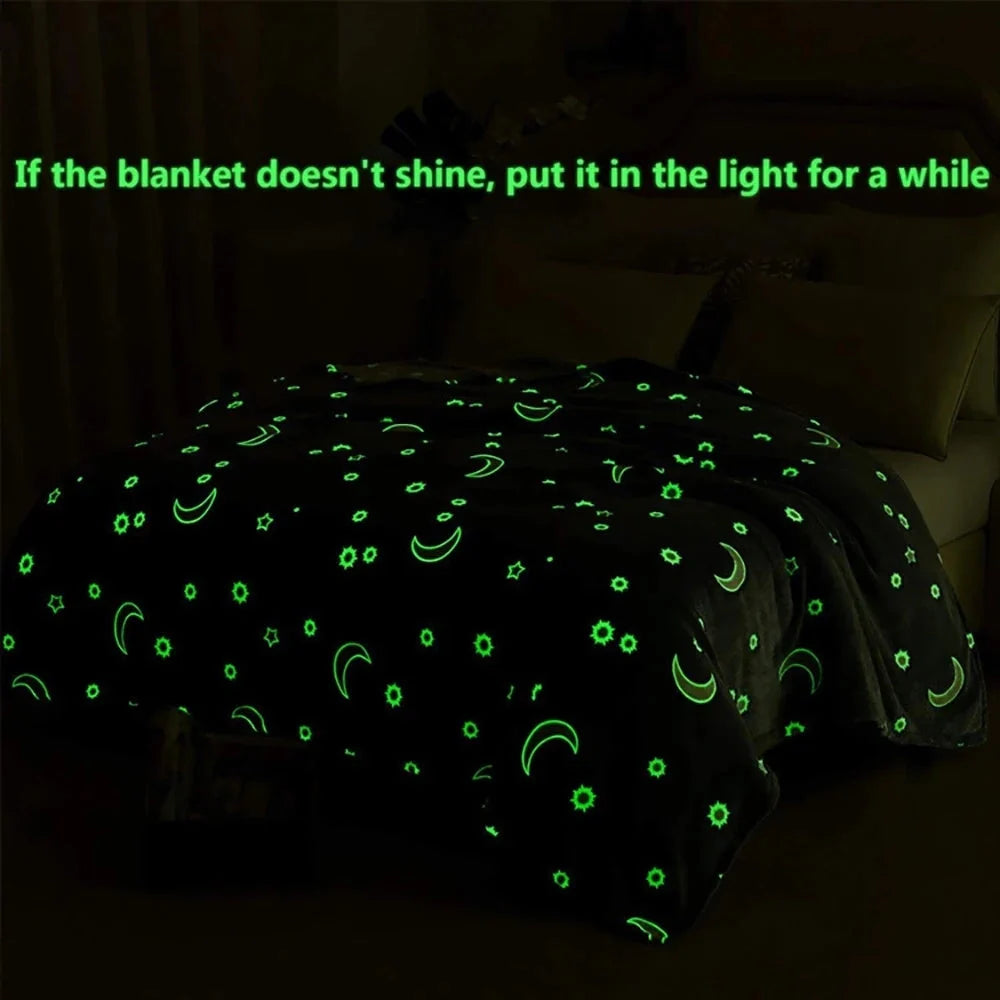 Glowing polyester wool blanket with stars and moons design, perfect for cosy nights