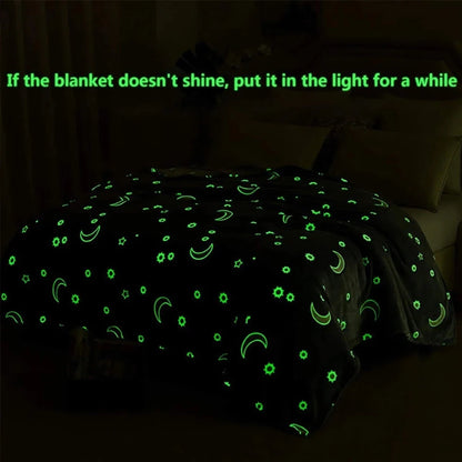 Glowing polyester wool blanket with stars and moons design, perfect for cosy nights