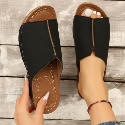 Fashionable wedge sandals in a variety of colors, featuring a peep-toe design and thick, durable soles for comfort and style